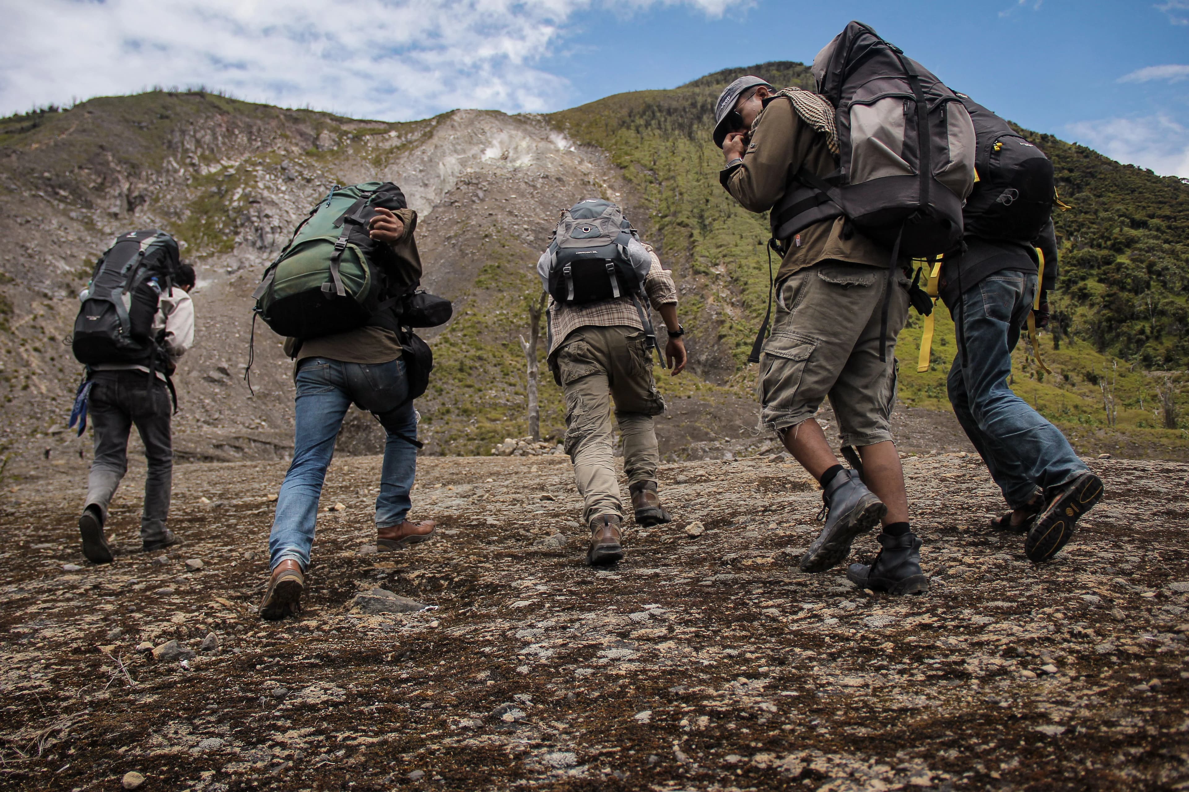 Hikers walking together on a mountain trail